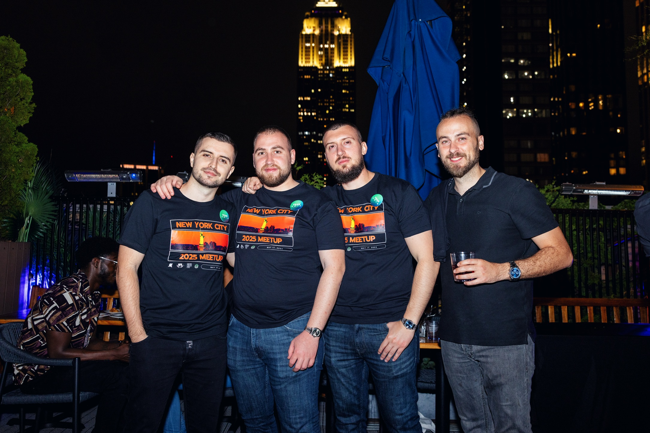 Members in NYC 2025 meetup shirts