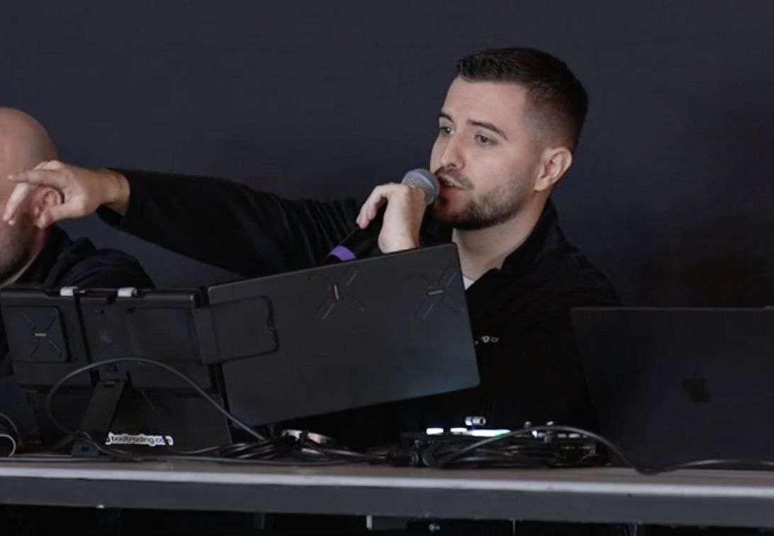 KV coaching on the mic at a live event